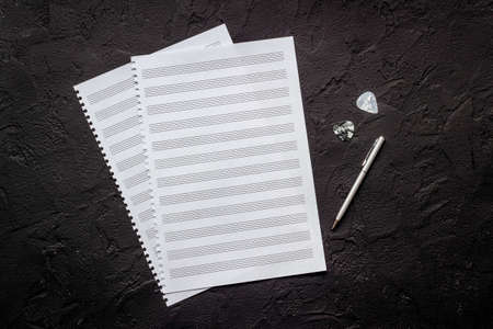Empty music sheets for writing notes, top view. Compose music conceptの写真素材