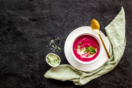 Red vegetarian beet root soup with sour creamの写真素材