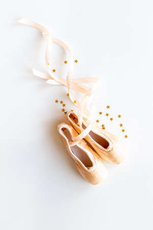 Used ballet pointe shoes or slippers with ribbon, top viewの写真素材