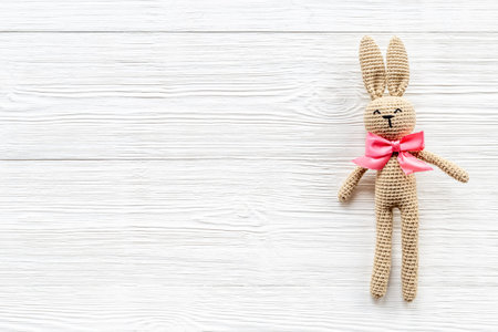 Handmade toy easter bunny for happy Easter backgroundの写真素材