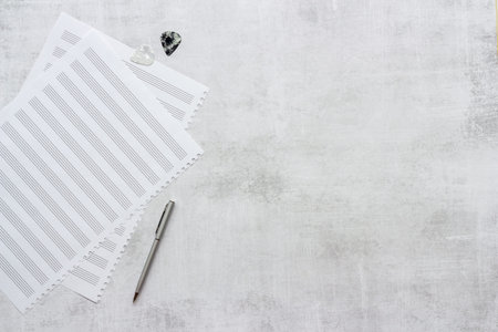 Empty music sheets for writing notes, top view. Compose music concept