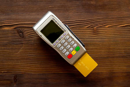Payment transactions with pos credit card terminal, top viewの写真素材
