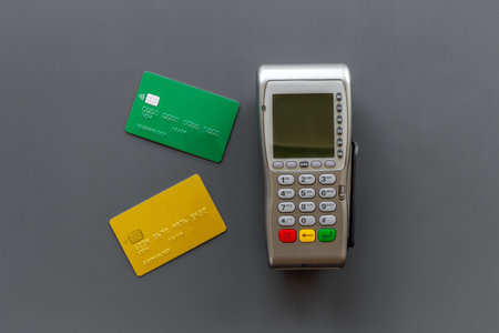 Payment by credit card with POS terminal, top view. E-commerce and payment concept