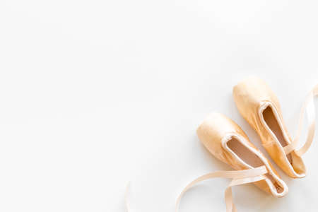 Used ballet pointe shoes or slippers with ribbon, top viewの写真素材