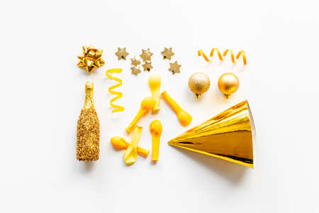 Golden party decoration flat lay. Marry Christmas and New year backgroundの写真素材