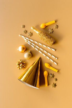 Golden party decoration flat lay. Marry Christmas and New year backgroundの写真素材