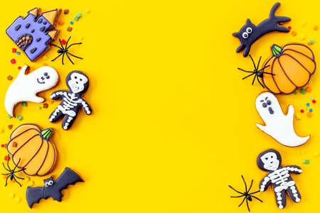 Funny Halloween party cookies with spiders flat lay top viewの写真素材