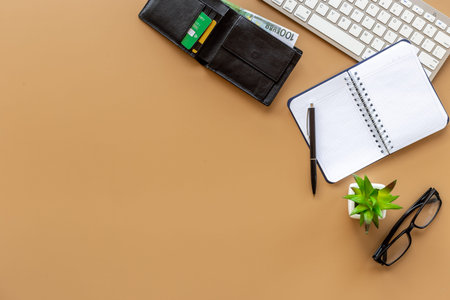 Man accessories on male working space office table. Top view