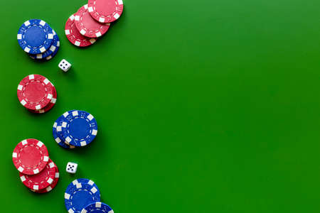 Casino gambling chips - poker background. Red and blue chipsの写真素材