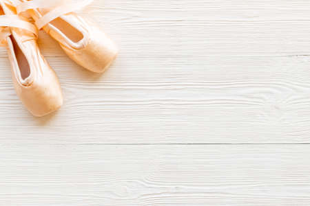 Ballet dancer set of pointe shoes or slippers with ribbonの写真素材