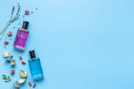 Perfumery cosmetics set of perfume bottles and flowersの写真素材