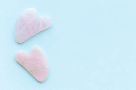 Rose gua sha massage stone for skin care beauty treatmentの写真素材