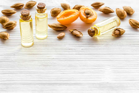 Essential apricot kernel oil with dried kernelの写真素材