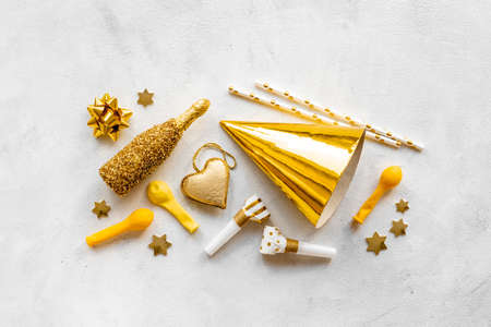 Birthday party layout with golden decor top viewの写真素材