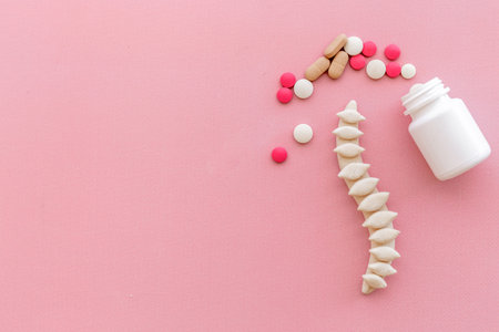 Strong healthy spine with medicine pills. Top view