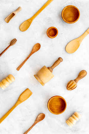 Cooking pattern with wooden kitchen utensils and cookware