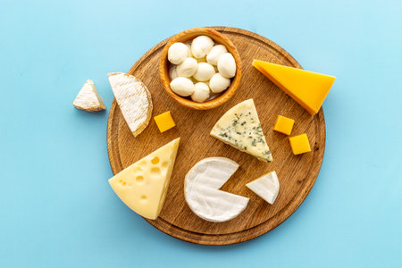 Various types of cheese layout. Dairy products flat lay