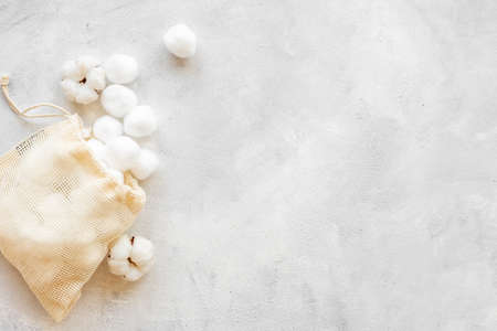 Cotton baby balls with cotton flowers, top viewの写真素材