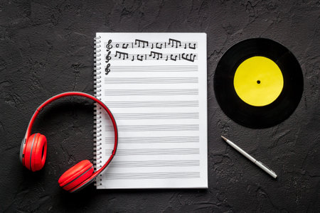 Music sheets with musical notes melody and vinyl recordの写真素材