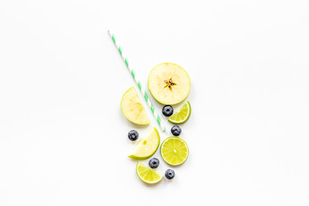 Citus cocktail or juice with berries and cocktail tube