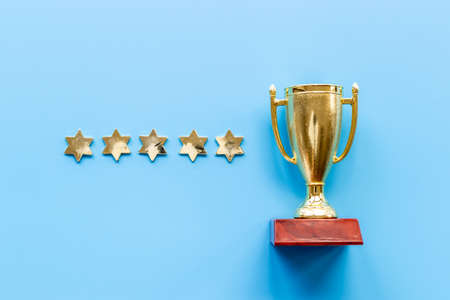 Five stars rating and winner trophy cup. Award and success conceptの写真素材
