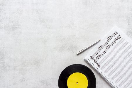 Music sheets with musical notes melody and vinyl recordの写真素材