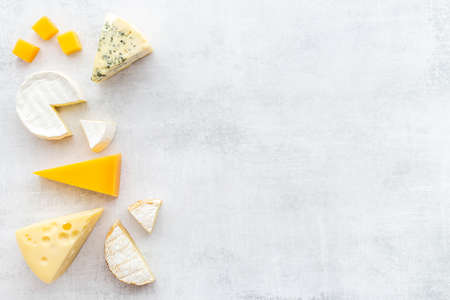 Various types of cheese layout. Dairy products flat layの写真素材