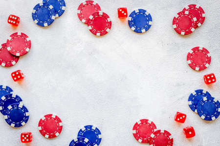 Poker gambling chips. Red and blue chips for casino gamesの写真素材