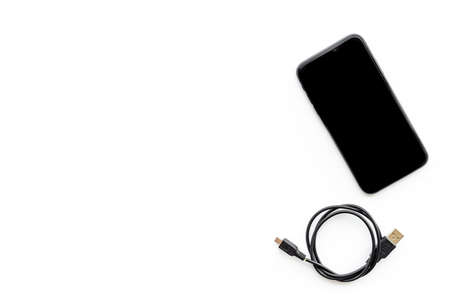 Usb cable for charging smartphone or laptop, top viewの写真素材