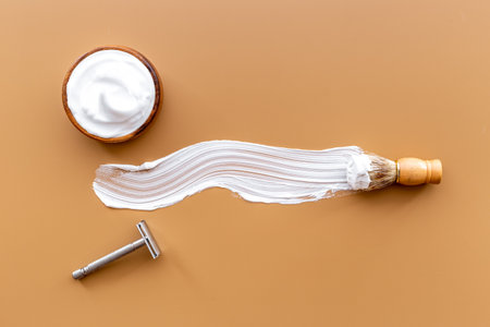 Shaving razor and foam in bowl - barber tools equipmentの写真素材