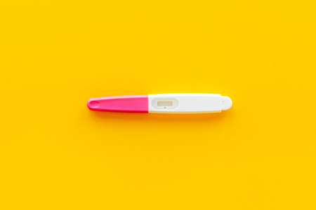 Pregnancy test top view. Pregnancy and female health care concept