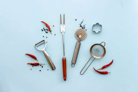 Set of stainless utensils cookware and tools, flat layの写真素材
