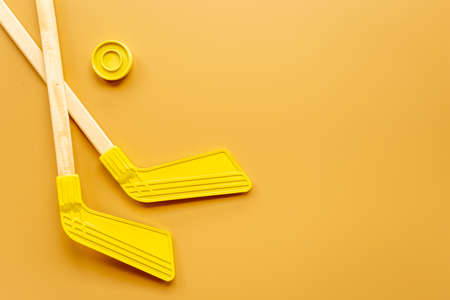 Two hockey sticks and puck. Competitive sports equipmentの写真素材