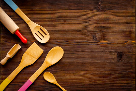 Set of wooden utensils and cookware tools, top viewの写真素材