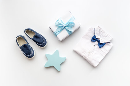 Baby shower party set with baby booties and gift box
