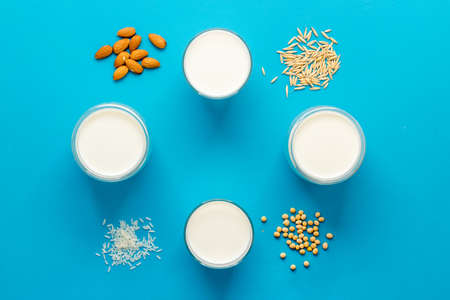 Dairy free substitute milk with nuts and cereals, top viewの写真素材