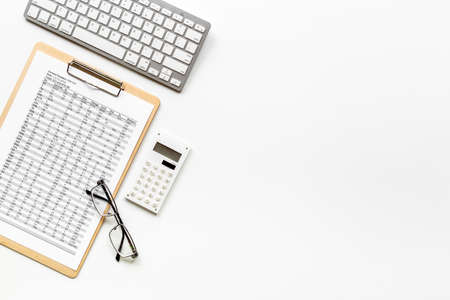Taxes accounting on office table with calculator,top viewの写真素材