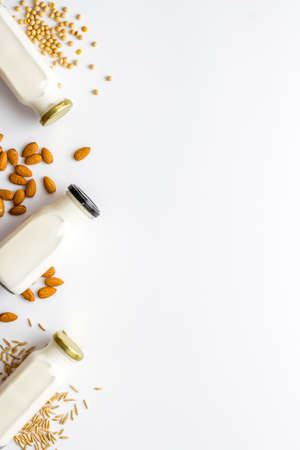 Non dairy vegan milk with nuts and cereals. Diet nutrition conceptの写真素材