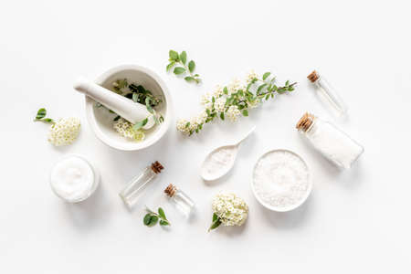White organic cosmetics products with white flowersの写真素材