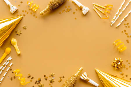 Birthday party layout with golden decor top viewの写真素材