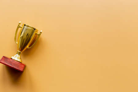 Champion award - golden trophy cup for winner, top viewの写真素材