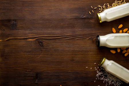 Dairy free substitute milk with nuts and cereals, top viewの写真素材