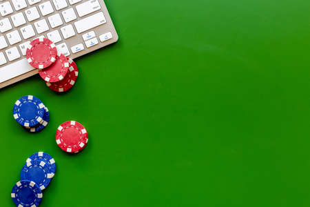 Online poker game concept with gambling chips. Casino backgroundの写真素材