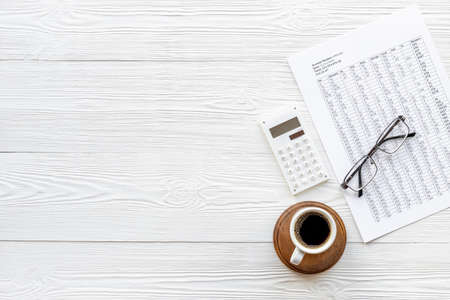 Taxes accounting on office table with calculator,top viewの写真素材