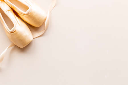 Ballet dancer set of pointe shoes or slippers with ribbonの写真素材