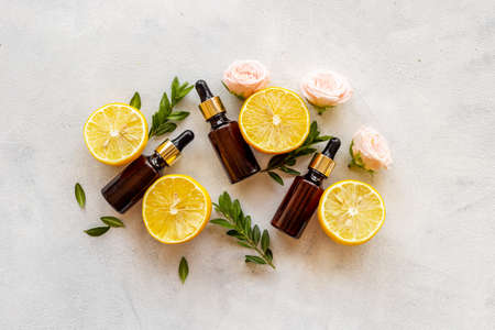 Essential oil with herbs citrus and flowers. Organic cosmetic ingredientsの写真素材