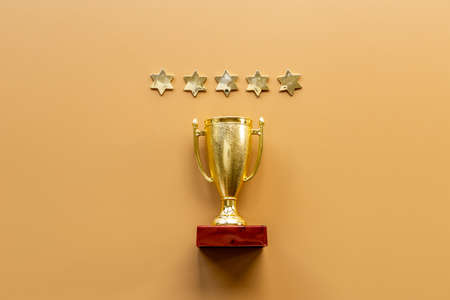 Five stars rating and winner trophy cup. Award and success conceptの写真素材