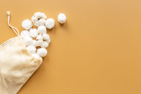 Cotton baby balls with cotton flowers, top viewの写真素材