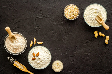Bowls of various gluten free flour - almond peanut oat and rice buckwheat flourの写真素材