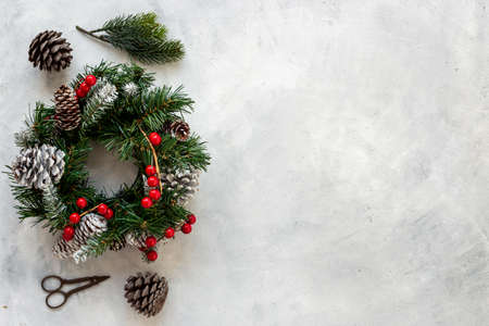 Christmas wreath with with fir tree, ribbon and decor. New year decorationの写真素材